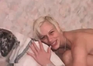 Blonde is training her doggy
