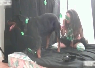 Babe pleasing her doggy