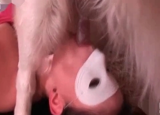 Nasty masked babe blows her dog