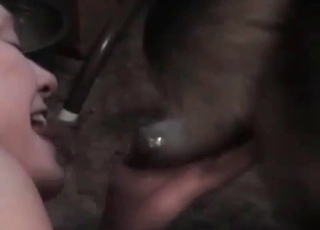 Blonde sucks a hairy doggy