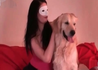 Pup licking masked girl