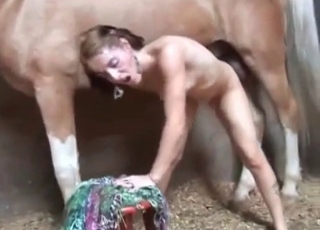 Brunette nailed by a horse