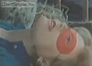 Masked whore sucks a stallion