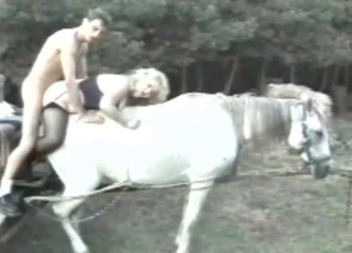 Guy fucks girl on a horse